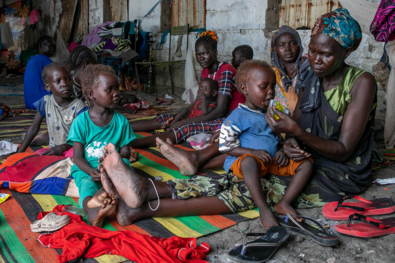 South Sudan. Woman With Her Children.